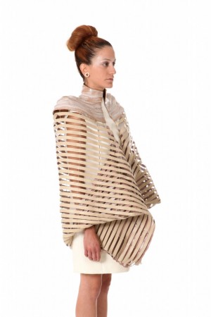 Flesh-toned silicone. A Dikla Sa'ar dress