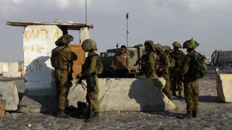IDF soldiers at the Qalandia checkpoint (photo credit: Nati Shohat/Flash90)
