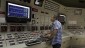 An employee of Israeli Electric Corporation worker in one of the control rooms of Rotenberg power plant near the coastal city of Ashkelon, July, 2012. (photo credit: Tsafrir Abayov/Flash90)