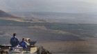 UN peacekeepers monitor the Syrian side of the border from an Israeli army post at Mount Bental near Kibbutz Merom Golan in the Golan Heights in July 2012. (Photo credit: Tsafrir Abayov/Flash90)