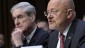 Director of National Intelligence James Clapper, right, accompanied by FBI Director Robert Mueller, testifying on Capitol Hill in Washington, Tuesday. (photo credit: AP/Susan Walsh)