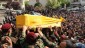 Hezbollah fighters in their military uniform, foreground, carry the coffin of Hezbollah fighter Hassan Faisal Shuker, 18, who was killed in a battle against Syrian rebels in the Syrian town of Qusair on Monday May 20 (photo credit: AP)