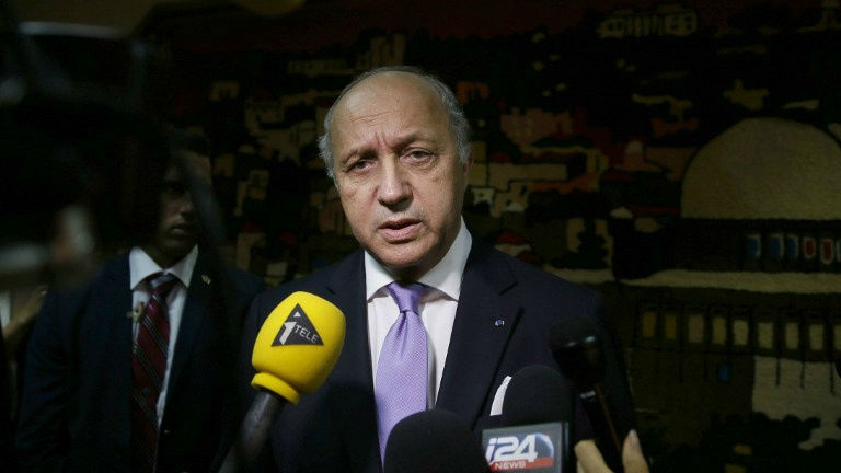French Foreign Minister Laurent Fabius speaks to the press following his meeting with Israeli Prime Minister Benjamin Netanyahu, prior to his departure from Ben Gurion International Airport, near Tel Aviv, on July 19, 2014. (photo credit: AFP/GALI TIBBON) French Foreign Minister Laurent Fabius speaks to the press following his meeting with Israeli Prime Minister Benjamin Netanyahu, prior to his departure from Ben Gurion International Airport, near Tel Aviv, on July 19, 2014. (photo credit: AFP/GALI TIBBON)