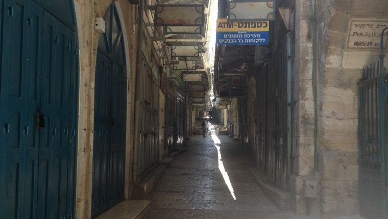 Shops in the Christian Quarter of Jerusalem's Old City are shuttered as part of a general strike protesting Operation Protective Edge in Gaza (photo credit: Sarah Tuttle-Singer/Times of Israel) Shops in the Christian Quarter of Jerusalem's Old City are shuttered as part of a general strike protesting Operation Protective Edge in Gaza (photo credit: Sarah Tuttle-Singer/Times of Israel)