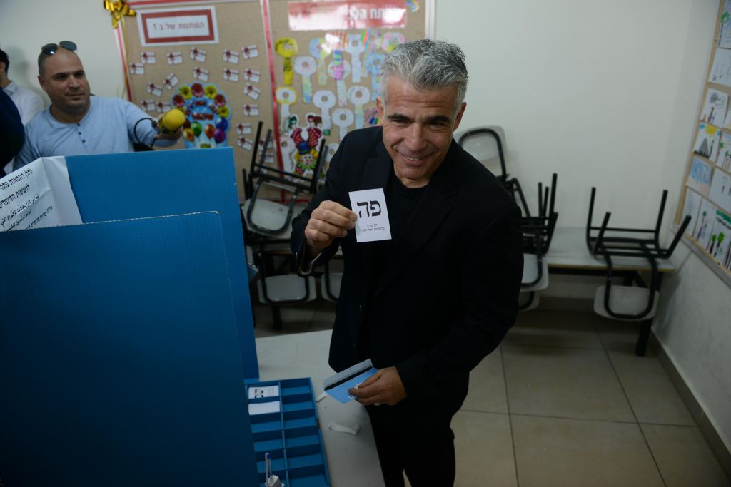 Yair Lapid casts his vote at a polling station in Tel Aviv on March 17, 2015. (Photo credit: Ben Kelmer / FLASH90) Yair Lapid casts his vote at a polling station in Tel Aviv on March 17, 2015. (Photo credit: Ben Kelmer / FLASH90)