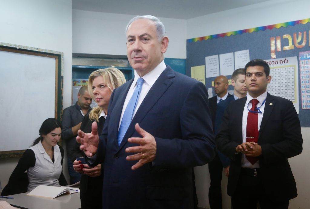 Benjamin Netanyahu and his wife Sara cast their vote at a polling station in Jerusalem on March 17, 2015. (photo credit: Photo by Marc Israel Sellem/POOL/FLASH90) Benjamin Netanyahu and his wife Sara cast their vote at a polling station in Jerusalem on March 17, 2015. (photo credit: Photo by Marc Israel Sellem/POOL/FLASH90)