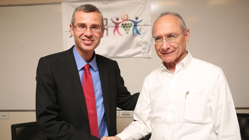 Yariv Levin (L) and Uzi Landau at the ceremony in which Levin took over the Tourism Ministry from Landau. (Photo credit: Hadas Parush/Flash90) Yariv Levin (L) and Uzi Landau at the ceremony in which Levin took over the Tourism Ministry from Landau. (Photo credit: Hadas Parush/Flash90)