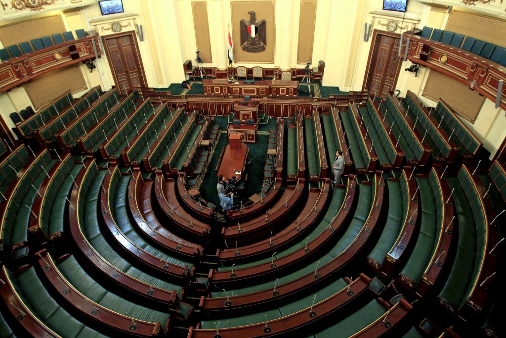 In this Sunday, Jan. 22, 2012 file photo, officials are seen in the People's Assembly as final preparations are made for an opening session of parliament, in Cairo. (AP Photo/Ahmed Gomaa, File) In this Sunday, Jan. 22, 2012 file photo, officials are seen in the People's Assembly as final preparations are made for an opening session of parliament, in Cairo. (AP Photo/Ahmed Gomaa, File)