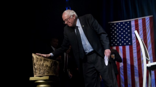 Democratic presidential candidate Sen. Bernie Sanders touches the Tree of Hope while taking the stage during a Community Conversation at the Apollo Theater on April 9, 2016 in the Harlem neighborhood of New York City. (Eric Thayer/Getty Images/AFP) Democratic presidential candidate Sen. Bernie Sanders touches the Tree of Hope while taking the stage during a Community Conversation at the Apollo Theater on April 9, 2016 in the Harlem neighborhood of New York City. (Eric Thayer/Getty Images/AFP)