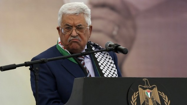 Palestinian Authority President Mahmoud Abbas speaking at a rally marking the 12th anniversary of the death of Yasser Arafat in Ramallah, November 10, 2016. (AFP/ ABBAS MOMANI)