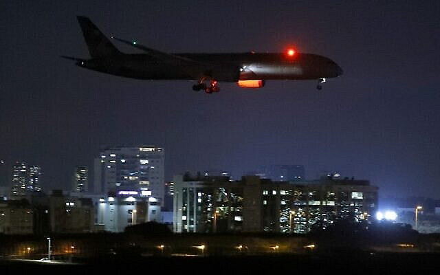 A cargo plane operated by Etihad Airways, carrying medical aid for Palestinians related to the coronavirus Covid-19 disease, prepares to land at Israel's Ben Gurion Airport near Tel Aviv on June 9, 2020. - The United Arab Emirates flew its first publicly announced flight to Israel on May 20, 2020 when Etihad Airways sent medical supplies to help the Palestinians cope with the coronavirus pandemic. Except for Jordan and Egypt, Arab countries have no official relations with Israel but Gulf Arab nations like the UAE and the Jewish state have been warming ties recently amid shared concern over Iran. (Photo by JACK GUEZ / AFP)