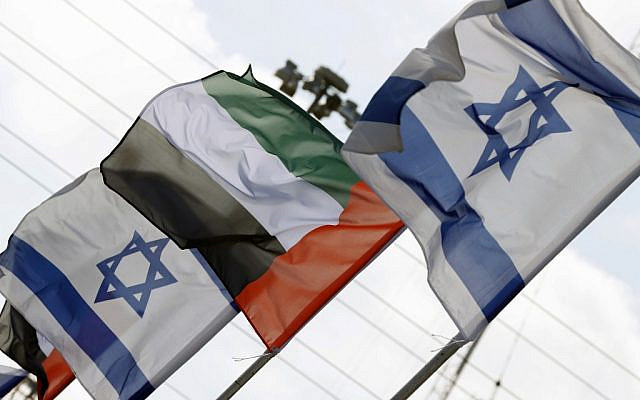 Israeli and United Arab Emirates flags line a road in the Israeli coastal city of Netanya, on August 16, 2020. (Photo by JACK GUEZ / AFP)