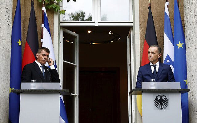 German Foreign Minister Heiko Maas and Israeli Foreign Minister Gabi Ashkenazi attend a news conference in front of the Liebermann Villa at the Wannsee lake in Berlin, Germany, August 27, 2020. (Michele Tantussi/Pool Photo via AP)